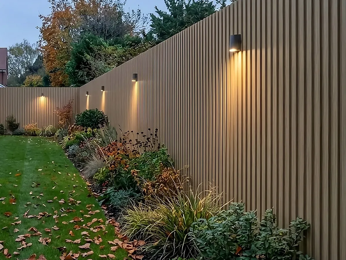 Garden wall clad in Light Oak wood-effect panels